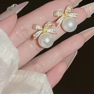 Elegant Gold and Pearl-Inspired Bow Earrings